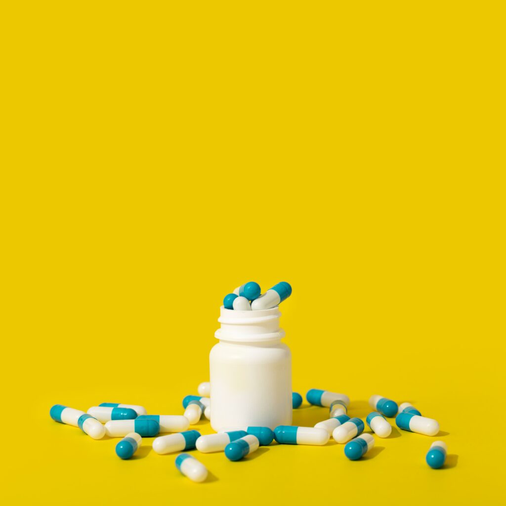 front-view-container-with-pills-copy-space-1024x1024-1