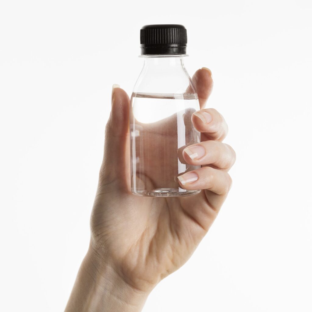 front-view-hand-holding-bottle-liquid-1024x1024-1 (1)